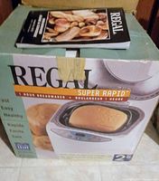 Box of Regal Super Rapid bread maker showing branding and bread image