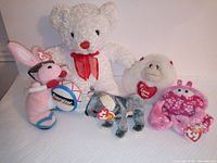 Full lot of 5 stuffed animals including three TY Beanie Babies, a Dan Dee bear and a heart holding gorilla toy.