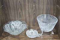 All three crystal dishes displayed together showing the variety of designs and sizes.