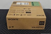 Cardboard shipping box with Sony ES series branding and STR-ZA810ES model text on top