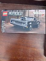 Front view of LEGO Speed Champions Fast & Furious 1970 Dodge Charger R/T set box showing model car and branding