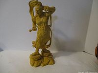 Full view of the 10.5-inch high boxwood carving figurine showing the entire figure and base.