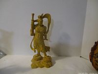 Full view of the 11-inch tall warrior boxwood carving figurine showing the entire figure standing on a base.