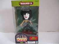 Front view of the Paul Stanley figurine in sealed branded box showing the figure, KISS logo and name Paul Stanley.