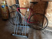 Side view of Colnago Sport bicycle and Stamina stand