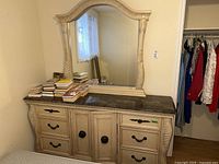 Front view of dresser with attached mirror