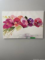 Full front view of the floral canvas artwork showing signature