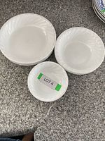 Grouped photo showing one of each bowl size: the large, cereal and small fruit bowls stacked separately on a kitchen counter.