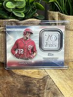 Front view of Juan Soto baseball card with silver 70th anniversary Topps logo patch medallion.