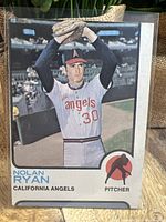 Front of the Nolan Ryan 1973 Topps baseball card showing miscut with extra edge of another card visible on the right side.