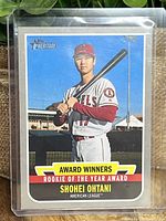 Front of the 2019 Topps Heritage Shohei Ohtani Rookie of the Year Award card, showing player image and award title.