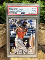 Front photo of Yordan Alvarez 2020 Topps #276 baseball card in PSA slab graded 9 Mint showing player in orange Houston Astros jersey.