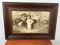 Full front view of the framed print showing the artwork and oak frame.