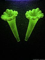 Pair of Fenton vaseline/uranium opalescent hobnail epergne vases glowing bright green under blacklight.