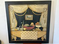 Full front view of the framed painting with still life scene