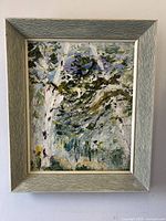 Front view showing the entire framed painting exposing the abstract composition with visible texture and brushstrokes.