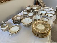Overview of full china set arranged on table