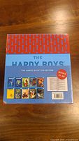 Front of the boxed set showing the title The Hardy Boys and covers of the books included numbered 21-30.