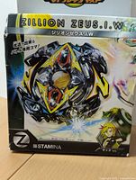 Front view of unopened Beyblade Zillion Zeus.I.W box with artwork and stamina type label