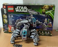 Front angle photo of assembled LEGO Star Wars 75013 Umbaran MHC model placed in front of its original box.