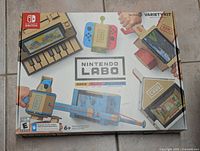 Front of Nintendo Labo Variety Kit box showing the 5 Toy-Con projects playable with the Nintendo Switch.