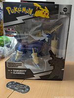 Front view of unopened Pokemon Samurott figure in original packaging showing the figure and Pikachu image on top left.