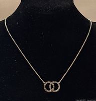 Full view of the Pandora necklace on black display showing chain and pendant