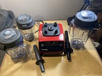 All components including blender base, three containers, two tampers