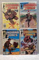 Photo showing four Good condition Indiana Jones comic books with colorful illustrated covers by Marvel from The Further Adventures of Indiana Jones series.