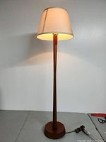 Full height view of lamp with shade on to show overall silhouette
