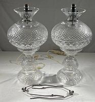 Pair of assembled lamps with harp fittings laid in front