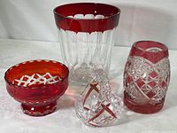 Group shot of four items: ice bucket, vase, footed bowl, basket