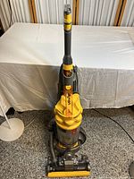 Front view of Dyson DC15 upright vacuum cleaner, showing overall condition and design.