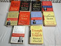 Overview of 11 hardcover books by Winston S. Churchill, titles visible, arranged on a surface.