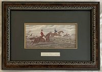Full view of framed fox hunt print with ornate wooden frame and double matting.