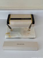 Sheaffer original box with a rectangular marble pen base featuring two empty pen holders.