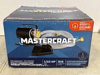Image of the Mastercraft utility transfer pump box showing product branding, specifications, and features.