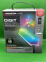 Front view of the boxed Monster Smart IlluminEssence Digit 3D LED Art Panels starter kit.