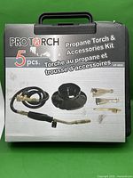 Front box image showing 5-piece PROTORCH propane torch and accessories kit in plastic carrying case