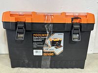 Front view of the jumbo professional toolbox in orange and black plastic with label showing 19 inch size and brand name Toolway.