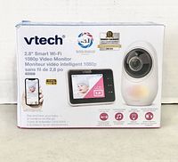 Photo of original boxed VTech 2.8 inch Smart Wi-Fi 1080p video monitor showing product image and packaging details.