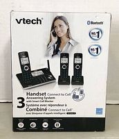 Front of the VTech box showing 3 handset cordless phone with answering system and smart call blocker