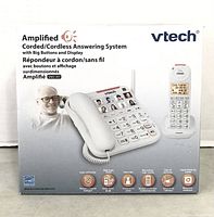 Photo of the retail box for VTech SN5147 Amplified Corded/Cordless Phone with Answering System showing main product features and images of the corded base phone and cordless handset.