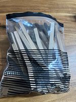 Bundle of 20 wire brushes in a sealed clear plastic bag, showing the product quantity and packaging.