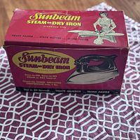Original red and yellow box with retro style print for Sunbeam Steam or Dry Iron standard type, marketing features noted.