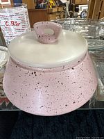 Pink and white speckled covered pottery bowl with lid