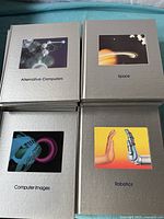 Four hardcover books from the Time-Life 'Understanding Computers' series with cover images: Alternative Computers, Space, Computer Images, Robotics.