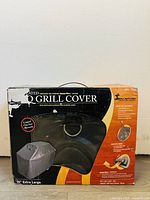 Front view of the Montana grill cover box showing product details and features.