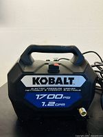 Front view of the Kobalt electric pressure washer showcasing the brand logo, PSI (1700) and GPM (1.2) specifications.