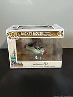 Front view of Funko Pop Rides Mickey Mouse vinyl figure in box showing figure inside vehicle and 50th Anniversary box art.